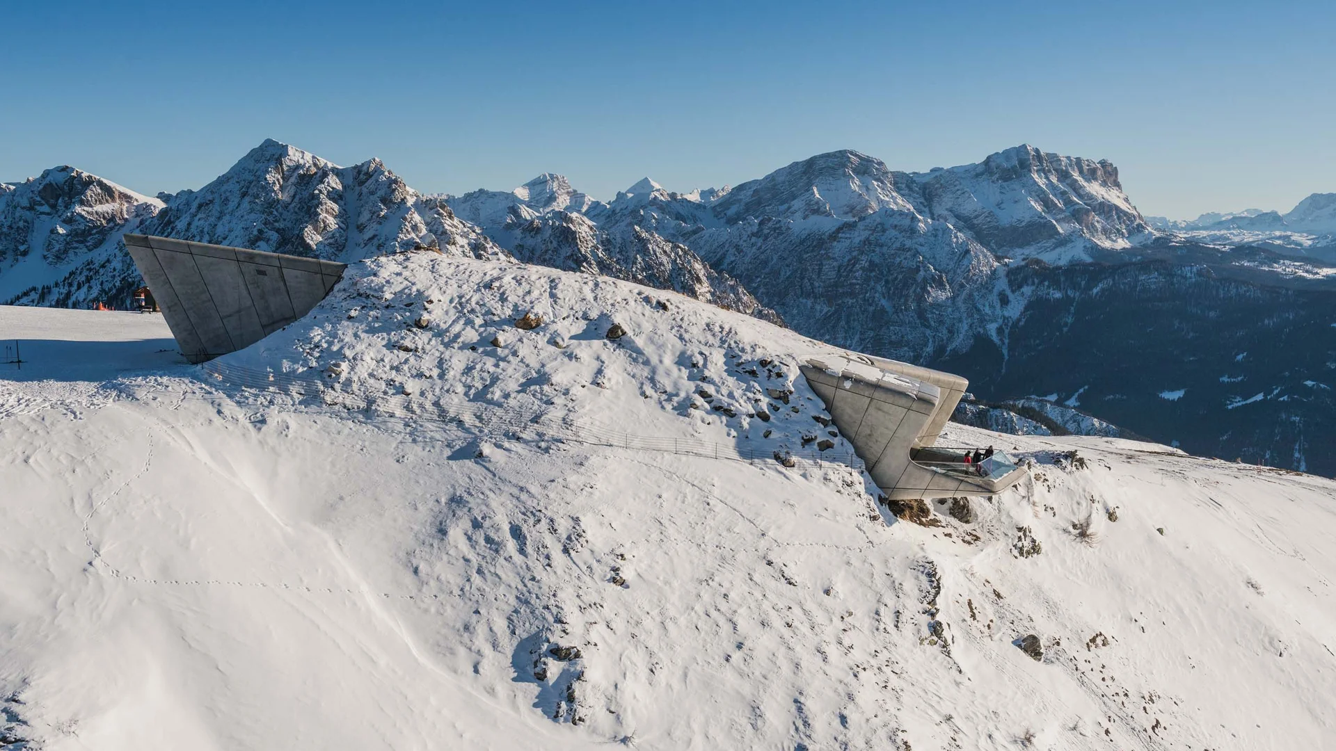 Hotel & Residence Lodenwirt photo gallery Snow-covered mountain with a modern viewing platform and Alpine panorama